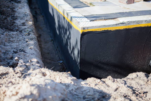 Professional Emergency Waterproofing technician working in Lancaster, PA